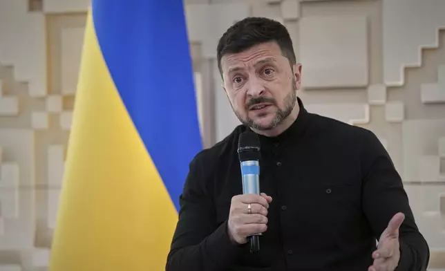 Ukrainian President Volodymyr Zelenskyy talks to journalists at the Ukrainian Embassy in Ankara, Turkey, Thursday, May 15, 2025. (AP Photo/Evgeniy Maloletka)