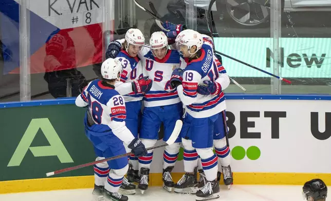 United States' Frank Nazar (910) celebrates with teammates after scoring against the Czech Republic during a Group B match at the hockey world championships, Tuesday, May 20, 2025, in Herning, Denmark. (Bo Amstrup/Ritzau Scanpix via AP)