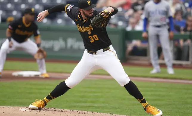Pittsburgh Pirates pitcher Paul Skenes delivers during the first inning of a baseball game against the Chicago Cubs in Pittsburgh, Thursday, May 1, 2025. (AP Photo/Gene J. Puskar)