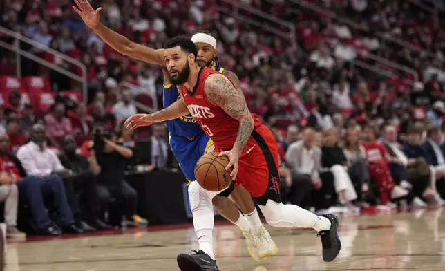 Houston Rockets guard Fred VanVleet (5) drives past Golden State Warriors guard Moses Moody during the first half of Game 5 of an NBA basketball first-round playoff series, Wednesday, April 30, 2025, in Houston. (AP Photo/David J. Phillip)