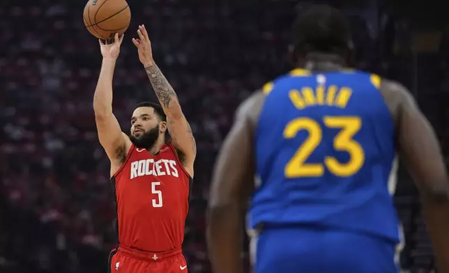Houston Rockets guard Fred VanVleet (5) shoots against he Golden State Warriors during the first half of Game 5 of an NBA basketball first-round playoff series, Wednesday, April 30, 2025, in Houston. (AP Photo/David J. Phillip)