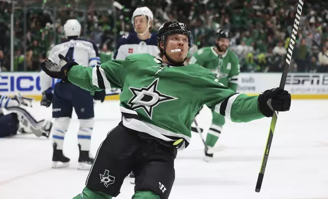 Dallas Stars center Mikael Granlund celebrates after scoring a power play goal against the Winnipeg Jets in the first period of Game 4 of a second-round NHL hockey playoff series in Dallas, Tuesday, May 13, 2025. (AP Photo/Gareth Patterson)