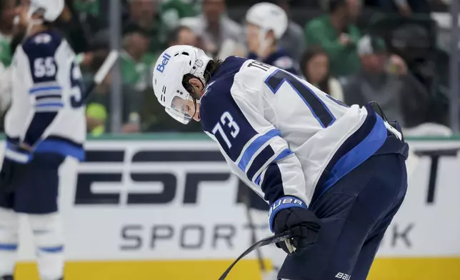 Winnipeg Jets left wing Brandon Tanev (73) reacts at the end of the second period of Game 4 of a second-round NHL hockey playoff series in Dallas, Tuesday, May 13, 2025. (AP Photo/Gareth Patterson)