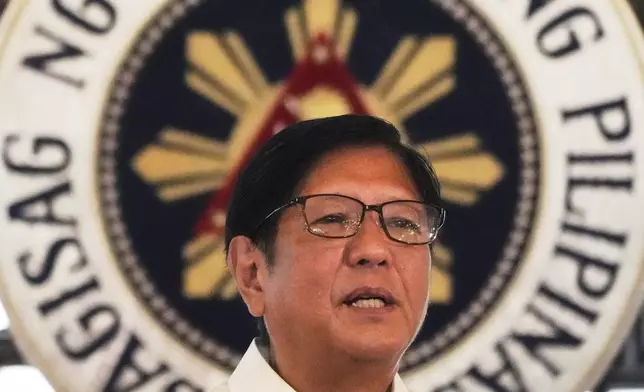 Philippine President Ferdinand Marcos Jr. speaks during the presentation of the newly enacted laws to stakeholders at the Malacanang Presidential Palace in Manila, Philippines Thursday, May 22, 2025. (AP Photo/Aaron Favila)