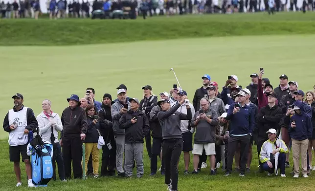 Jordan Spieth hits on the 13th hole during the second round of the Truist Championship golf tournament at the Philadelphia Cricket Club, Friday, May 9, 2025, in Flourtown. (AP Photo/Matt Rourke)