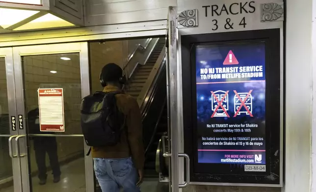 An information screen informing commuters of the rail service suspension, due to the strike by Union members from the Brotherhood of Locomotive Engineers and Trainmen, inside Newark Penn Station on Friday, May 16, 2025 in Newark, New Jersey. (AP Photo/Stefan Jeremiah)