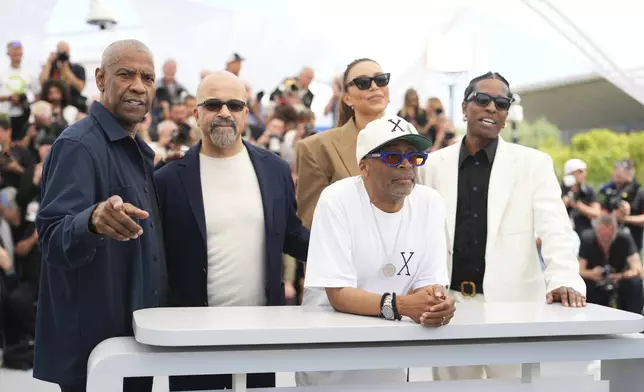 Denzel Washington, from left, Jeffrey Wright, Ilfenesh Hadera, director Spike Lee and A$AP Rocky pose for photographers at the photo call for the film 'Highest 2 Lowest' at the 78th international film festival, Cannes, southern France, Monday, May 19, 2025. (Photo by Lewis Joly/Invision/AP)