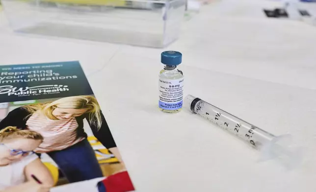 A dose of the measles, mumps, and rubella (MMR) vaccination awaits the next patient during a vaccine clinic at Southwestern Public Health in St. Thomas, Ontario, Canada, on Tuesday, March 4, 2025. (Geoff Robins/The Canadian Press via AP)