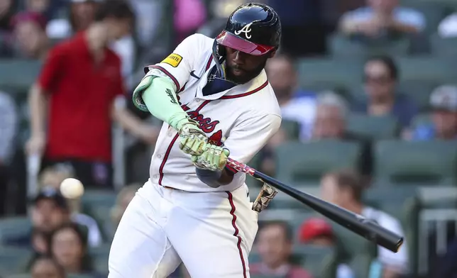 Atlanta Braves' Michael Harris II drives in a run in the third inning of a baseball game against the Washington Nationals, Monday, May 12, 2025, in Atlanta. (AP Photo/Colin Hubbard)