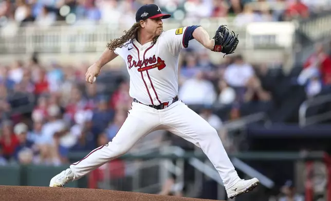 Atlanta Braves pitcher Grant Holmes delivers in the first inning of a baseball game against the Washington Nationals, Monday, May 12, 2025, in Atlanta. (AP Photo/Colin Hubbard)
