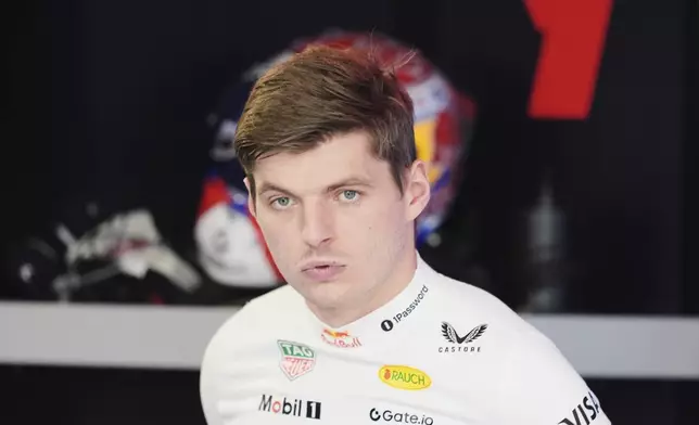 Red Bull driver Max Verstappen of the Netherlands stands in the pits during a practice session for the Formula One Miami Grand Prix auto race, Friday, May 2, 2025, in Miami Gardens, Fla. (AP Photo/Rebecca Blackwell)