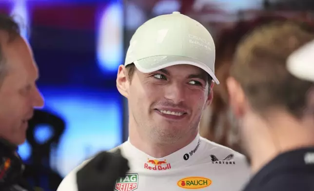 Red Bull driver Max Verstappen of the Netherlands stands in the pits during a practice session for the Formula One Miami Grand Prix auto race, Friday, May 2, 2025, in Miami Gardens, Fla. (AP Photo/Rebecca Blackwell)