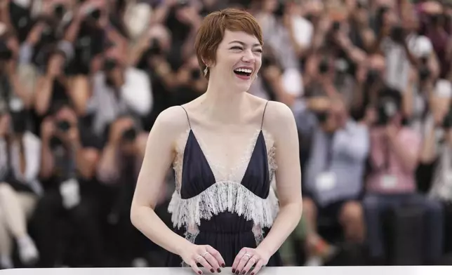 Emma Stone poses for photographers at the photo call for the film 'Eddington' at the 78th international film festival, Cannes, southern France, Saturday, May 17, 2025. (Photo by Scott A Garfitt/Invision/AP)