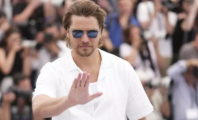 Luke Grimes poses for photographers at the photo call for the film 'Eddington' at the 78th international film festival, Cannes, southern France, Saturday, May 17, 2025. (Photo by Scott A Garfitt/Invision/AP)