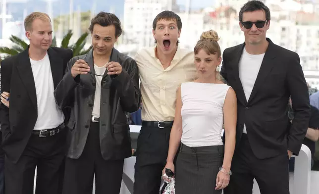 Producer Archie Pearch, from left, Frank Dillane, director Harris Dickinson, Megan Northam and producer Scott O'Donnell pose for photographers at the photo call for the film 'Urchin' at the 78th international film festival, Cannes, southern France, Saturday, May 17, 2025. (AP Photo/Natacha Pisarenko)