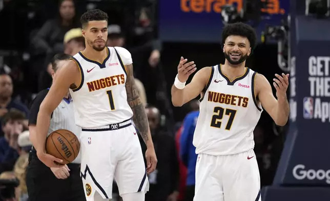 Denver Nuggets guard Jamal Murray, right, reacts after receiving a foul call against him as forward Michael Porter Jr. stands by during the second half in Game 6 of an NBA basketball first-round playoff series against the Los Angeles Clippers, Thursday, May 1, 2025, in Inglewood, Calif. (AP Photo/Mark J. Terrill)