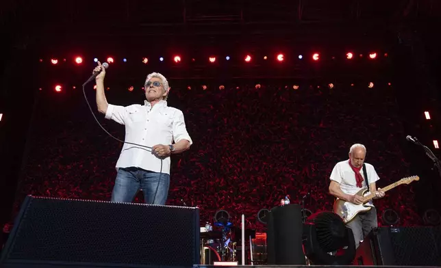 FILE - Roger Daltrey, left, and Pete Townshend of The Who perform at TQL Stadium on May 15, 2022, in Cincinnati. (Photo by Amy Harris/Invision/AP)