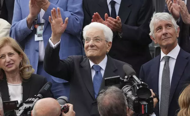 Italy's President Sergio Mattarella, center, attends the Italian Open tennis final match between Coco Gauff of the United States and Jasmine Paolini of Italy at the Foro Italico, in Rome, Saturday, May 17, 2025. (AP Photo/Alessandra Tarantino)