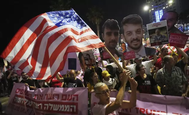 Israelis protest outside the U.S. Embassy Branch Office in Tel Aviv on Tuesday, May 13, 2025, demanding the release of hostages held by Hamas in the Gaza Strip. (AP Photo/Ariel Schalit)