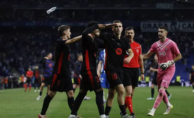 Barcelona's Fermin Lopez, celebrates after scoring his side's second goal during a Spanish La Liga soccer match between Barcelona and Espanyol at Lluis Companys Olympic Stadium in Barcelona, Spain, Thursday, May 15, 2025. (AP Photo/Joan Monfort)