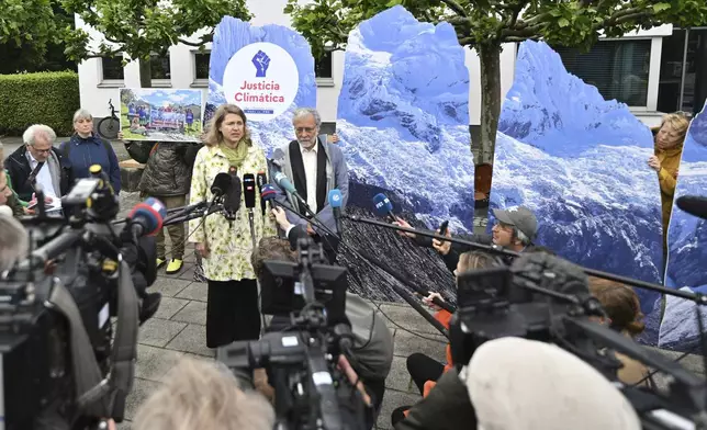 Lawyer Roda Verheyen speaks to journalists before the verdict is announced in the hearing of a climate lawsuit brought by Peruvian mountain farmer that glaciers above his hometown of Huaraz are melting due to German energy company RWE greenhouse gas emissions, at Hamm Higher Regional Court, in Hamm, Germany, Wednesday, May 28, 2025. (Bernd Thissen/dpa via AP)