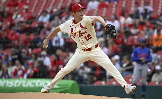 St. Louis Cardinals starting pitcher Erick Fedde throws in the first inning during the first baseball game of a doubleheader against the New York Mets, Sunday, May 4, 2025, in St. Louis. (AP Photo/Joe Puetz)