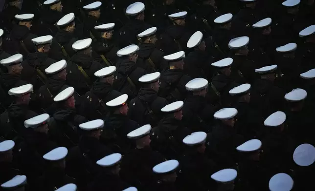 Russian servicemen march towards the Red Square prior to the Victory Day military parade rehearsal in Moscow, Russia, Saturday, May 3, 2025. (AP Photo/Pavel Bednyakov)