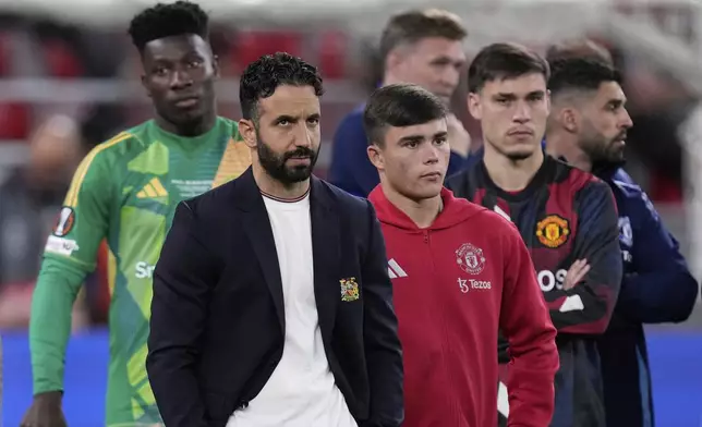 Manchester United's head coach Ruben Amorim reacts at the end of the Europa League final soccer match between Tottenham Hotspur and Manchester United at the San Mames Stadium in Bilbao, Spain, Wednesday, May 21, 2025. (AP Photo/Bernat Armangue)