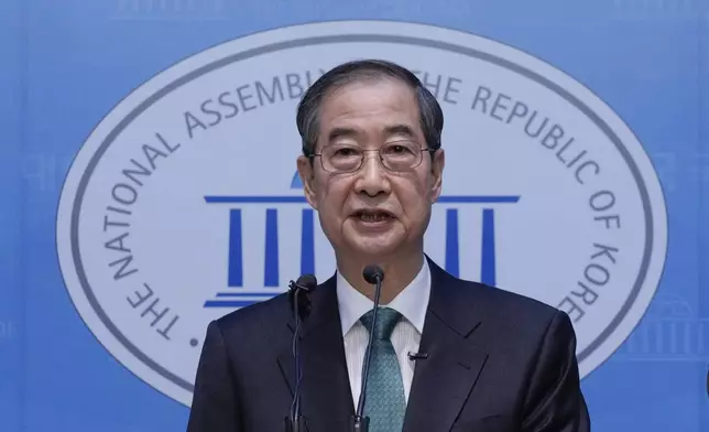 South Korean former Prime Minister Han Duck-soo speaks during a press conference to announce a presidential bid at the National Assembly in Seoul, South Korea, Friday, May 2, 2025. (AP Photo/Ahn Young-joon)
