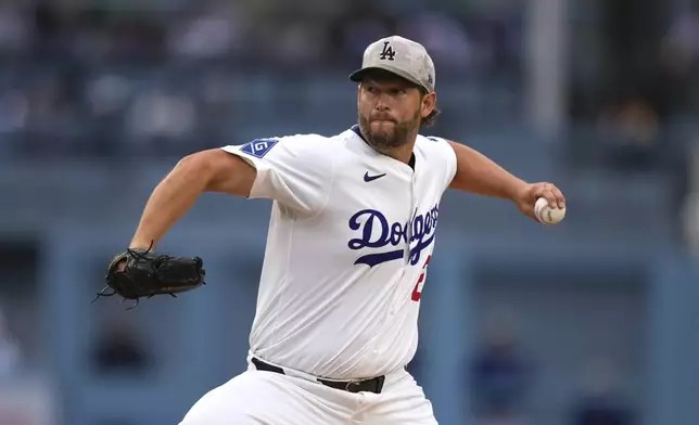 Los Angeles Dodgers starting pitcher Clayton Kershaw throws to the plate during the first inning of a baseball game against the Los Angeles Angels, Saturday, May 17, 2025, in Los Angeles. (AP Photo/Mark J. Terrill)