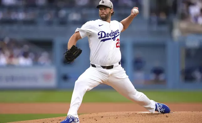 Los Angeles Dodgers starting pitcher Clayton Kershaw throws to the plate during the first inning of a baseball game against the Los Angeles Angels, Saturday, May 17, 2025, in Los Angeles. (AP Photo/Mark J. Terrill)