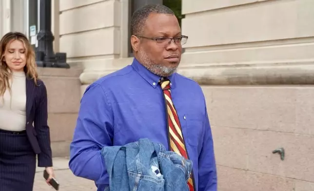 Steve Anthony Shand Leaves court after being sentenced on human smuggling charges Wednesday, May 28, 2025, in Fergus Falls, Minn., related to the 2022 deaths of an Indian family who froze while crossing the Canadian Border into the U.S. (AP Photo/Mark Vancleave)