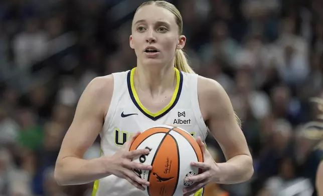 Dallas Wings guard Paige Bueckers (5) looks toward a referee after being called for a foul during the second half of a WNBA basketball game against the Minnesota Lynx, Wednesday, May 21, 2025, in Minneapolis. (AP Photo/Abbie Parr)
