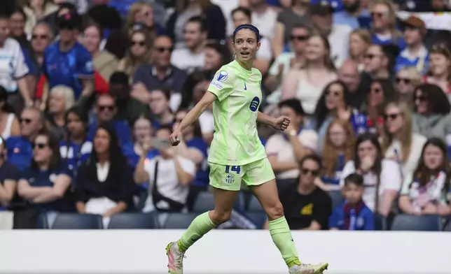 FILE - Barcelona's Aitana Bonmati celebrates after scoring the opening goal during the women's Champions League semifinals, second leg, soccer match against Chelsea FC at Stamford Bridge in London, April 27, 2025. (AP Photo/Dave Shopland, File