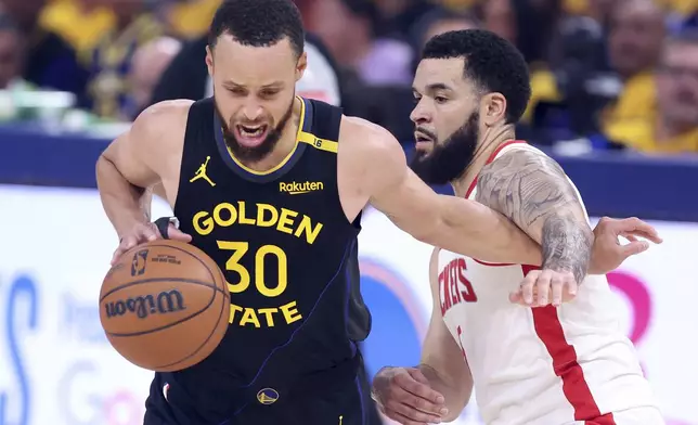 Golden State Warriors' Stephen Curry (30) is fouled by Houston Rockets' Fred VanVleet, right, in the first quarter of Game 6 of an NBA basketball first-round playoff series Friday, May 2, 2025, in San Francisco. (Scott Strazzante/San Francisco Chronicle via AP)