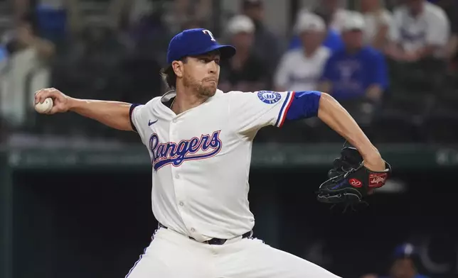 Texas Rangers starting pitcher Jacob deGrom throws during the first inning of a baseball game against the Houston Astros, Thursday, May 15, 2025, in Arlington, Texas. (AP Photo/LM Otero)