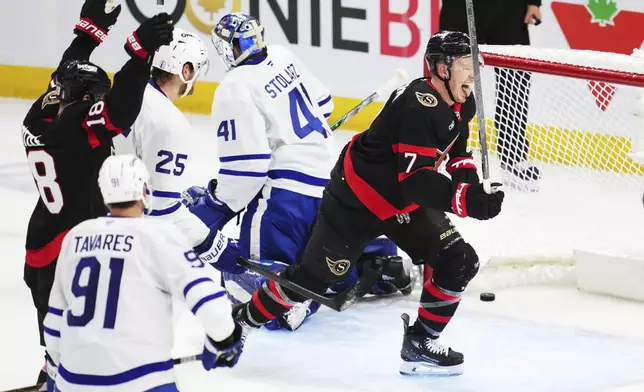Ottawa Senators' Brady Tkachuk (7) scores against Toronto Maple Leafs goaltender Anthony Stolarz (41) during the second period of Game 6 of a first-round NHL hockey playoff series in Ottawa, Ontario, Thursday, May 1, 2025. (Sean Kilpatrick/The Canadian Press via AP)