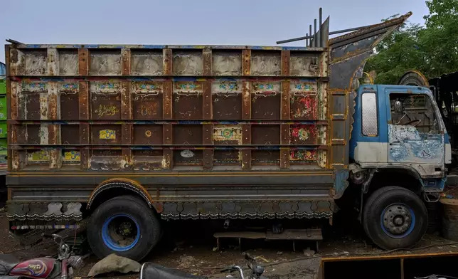 A truck waits for refurbishment at a yard for workshops in Rawalpindi, Pakistan, on Saturday, April 19, 2025. (AP Photo/Anjum Naveed)