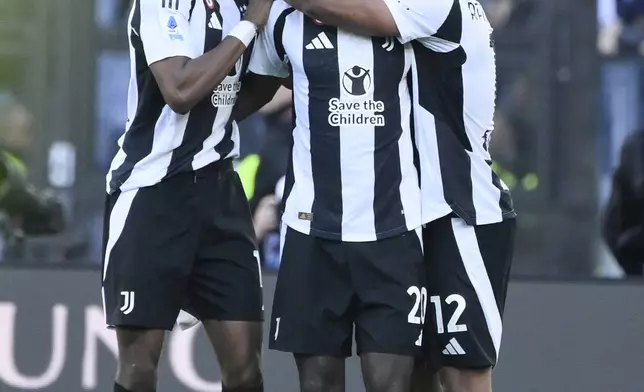 Juventus's Randal Kolo Muani, left, celebrates scoring during the Serie A soccer match between Lazio and Juventus at Rome's Olympic stadium, Saturday, May 10, 2025. (Fabrizio Corradetti/LaPresse via AP)