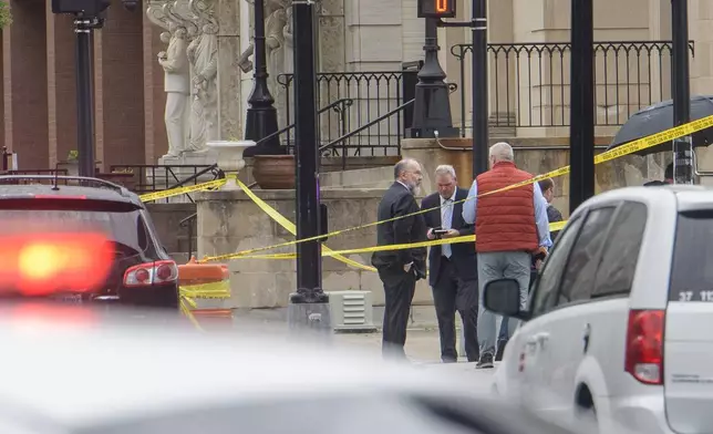 Law enforcement work the scene after two staff members of the Israeli Embassy in Washington were shot and killed outside the Capital Jewish Museum, Thursday, May 22, 2025, in Washington. (AP Photo/Rod Lamkey, Jr.)