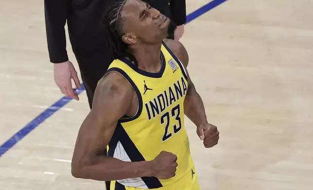 Indiana Pacers forward Aaron Nesmith (23) reacts at the end of overtime against the New York Knicks of Game 1 of the NBA basketball Eastern Conference final, Wednesday, May 21, 2025, in New York. (AP Photo/Adam Hunger)