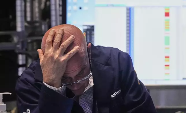 Trader Anthony Confusione works on the floor of the New York Stock Exchange, Monday, May 5, 2025. (AP Photo/Richard Drew)