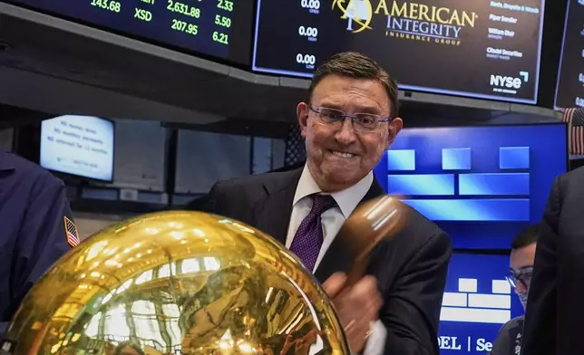 Robert Ritchie, CEO of American Integrity Insurance Company, rings a ceremonial bell as his company's IPO begins trading, on the floor of the New York Stock Exchange, Thursday, May 8, 2025. (AP Photo/Richard Drew)