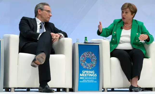 Germany's Finance Minister Jörg Kukies, left, and International Monetary Fund (IMF) Managing Director Kristalina Georgieva speak at the forum Debate on the Global Economy during the World Bank/IMF Spring Meetings at the International Monetary Fund (IMF) headquarters in Washington, Thursday, April 24, 2025. (AP Photo/Jose Luis Magana)