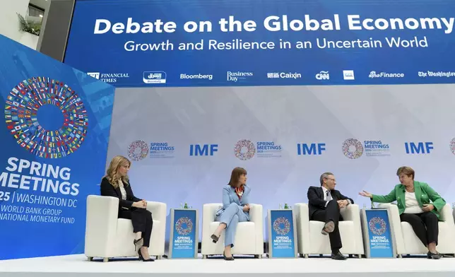 From left, Sara Eisen, Britain's Chancellor of the Exchequer Rachel Reeves, Germany's Finance Minister Jörg Kukies and International Monetary Fund (IMF) Managing Director Kristalina Georgieva speak at the forum Debate on the Global Economy during the World Bank/IMF Spring Meetings at the International Monetary Fund (IMF) headquarters in Washington, Thursday, April 24, 2025. (AP Photo/Jose Luis Magana)