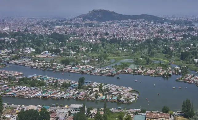 Rows of empty houseboats in Dal lake, one of the major tourist destination seen from a mountain in Srinagar, Indian controlled Kashmir, India, Tuesday, May 20, 2025. (AP Photo/Dar Yasin)