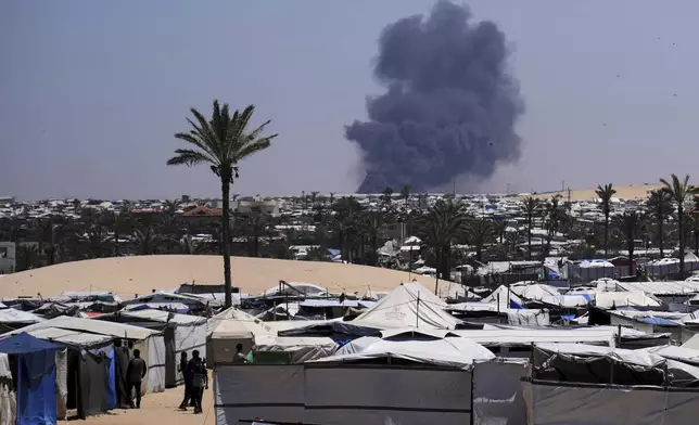 Smoke rises from an Israeli army airstrike south of Khan Younis, Gaza, Wednesday, May 21, 2025. (AP Photo/Abdel Kareem Hana)