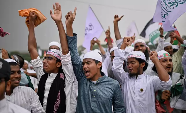 Thousands of activists of Islamist group Hefazat-e-Islam denounce proposed recommendations for equal rights for Muslim women, at a protest rally in Dhaka, Bangladesh, Saturday, May 3, 2025. (AP Photo/Mahmud Hossain Opu)