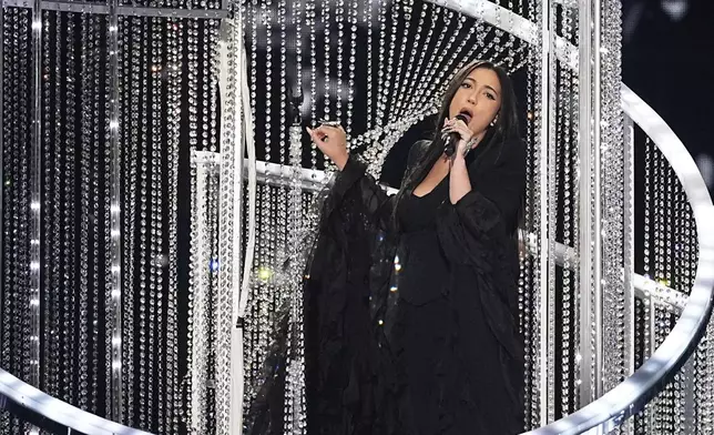 Yuval Raphael from Israel performs the song "New Day Will Rise" during the Grand Final of the 69th Eurovision Song Contest, in Basel, Switzerland, Saturday, May 17, 2025. (AP Photo/Martin Meissner)