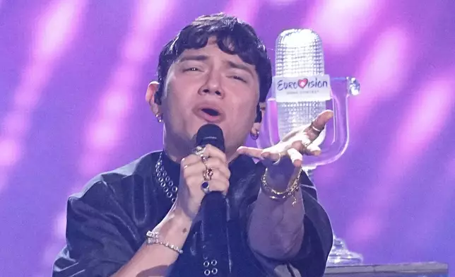 Winner of the Eurovision Song Contest JJ from Austria performs the winning song "Wasted Love" during the Grand Final of the 69th Eurovision Song Contest, in Basel, Switzerland, early Sunday, May 18, 2025. (AP Photo/Martin Meissner)